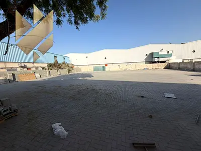 Special offer for rent: an industrial yard in Industrial Area 13, strategically located on the main road