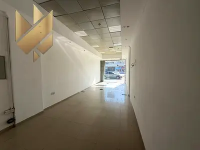 Shop in Industrial 5 500 sqft main road with rear storage space prime location rent AED 100000 yearly 4 payments 10 percent cheque deposit