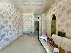 2 DOOR SHOP WITH SPLIT A/C, &amp; ATTACHED TOILET AVAILABLE IN AL QULAYAA AREA OPPOSITE OF SHARJAH L