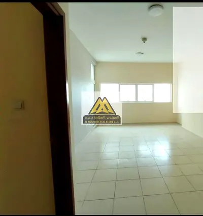 Apartment for sale, one bedroom and living room, in Ajman Towers One, 4th floor, large area, sea view