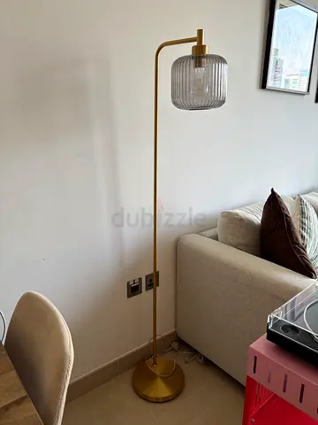 Floor lamp with gold body