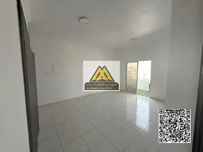 For annual rent: One-bedroom apartment with a balcony in Al Rashidiya 3, Ajman, directly opposite Ajman One Towers. Prime location on a main street, c