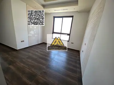 A premium 2-bedroom apartment with a living room for annual rent in Al Jurf 2 – Ajman, featuring two master bedrooms, built-in wardrobes, and high-end