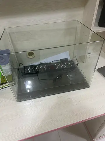 Used glass aquarium tank with LED light ( with automatic timer), small soil bag, bio filter