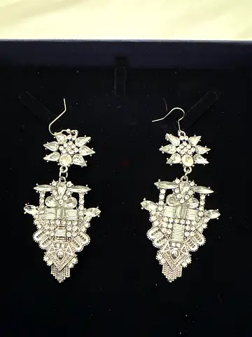 Pair of silver-tone crystal chandelier earrings — elegant statement drop earrings