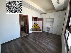 Two-bedroom apartment with a master living room for rent in Al Jurf 3, Ajman, with central air condi
