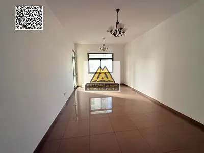 Two-bedroom apartment for rent in Al Rashidiya 1, Ajman. Second occupant. Spacious, with central air conditioning, balcony, and built-in wardrobes. Lo