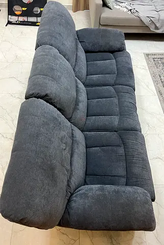 Three seater reclining sofa