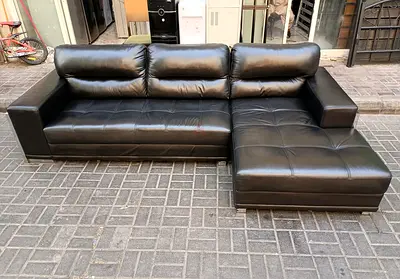 Black L-shaped Leather Sofa with Chaise – Good Condition
