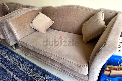 2-seater beige upholstered sofa set in good condition