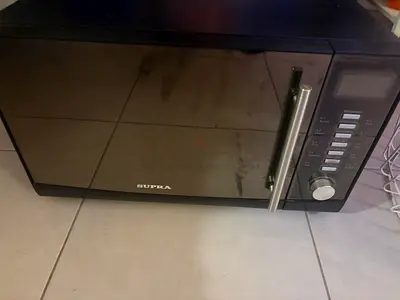Supra Microwave Oven - Used, Good Working Condition