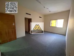 A spacious 1-bedroom apartment with a living room for annual rent in Al Nuaimiya – Ajman, located 