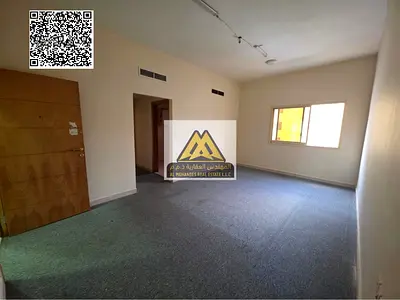 A spacious 1-bedroom apartment with a living room for annual rent in Al Nuaimiya – Ajman, located directly on Kuwait Street in a prime and vibrant are