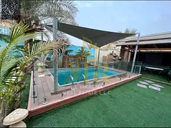 A villa with all electricity, water and air conditioning fees included, on the main street, ready to