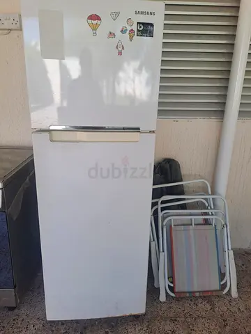 White double-door refrigerator - good working condition