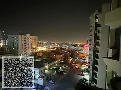 One-bedroom apartment for sale in Al Rashidiya Towers, Ajman, opposite Nesto Market
