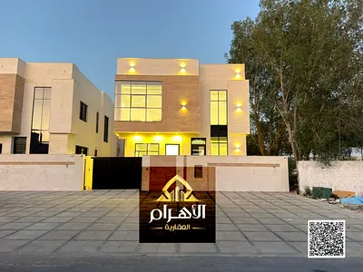 فقط بقيمة ايجارك | تملك فيلا فاخرة بالحليو 2 عجمان | 5 غرف ماستر وروف |جاهزة للسكن بالكهرباء والمياه وشامل رسوم التسجيل والتملك