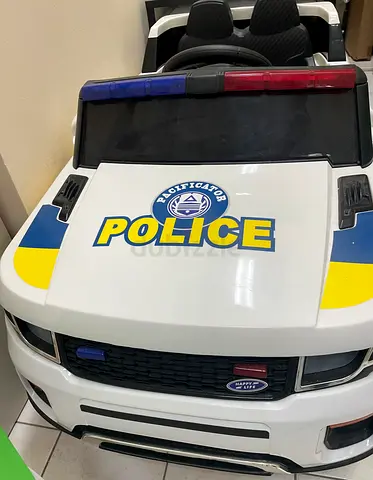 Kids Ride-On Police Car (Battery Powered) - Excellent Condition