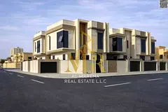 Luxury Villa in Al Muwaihat 2: Modern Design with Yard, Outdoor Seating Area, and Central Air Condit