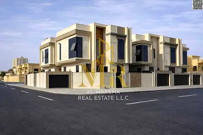 Luxury Villa in Al Muwaihat 2: Modern Design with Yard, Outdoor Seating Area, and Central Air Conditioning - Freehold A luxurious villa in Al Muwaiha