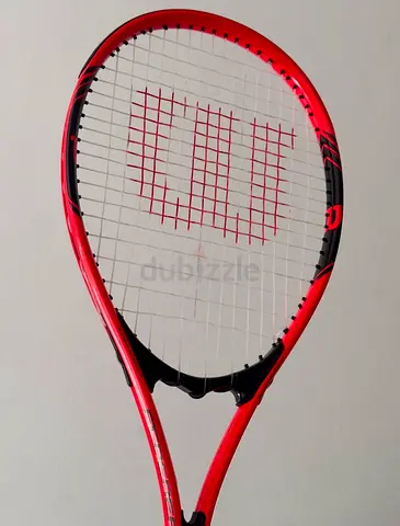 Wilson Federer 27inch Tennis Racket with 7 used tennis balls - (Good Condition)