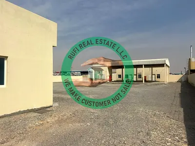 29,000 sq feet || road base || industrial land available with open shed for Rent in New modern industrial area UMQ