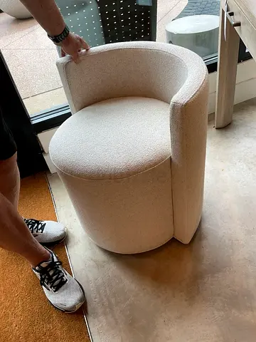 Compact Cream Upholstered Accent Swivel Chair
