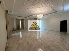 A distinctive villa for annual rent in Al Raqaib, Ajman, featuring spacious areas and a prime locati