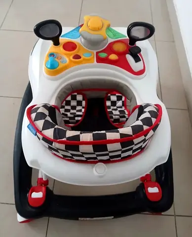 Baby activity walker with musical tray — good condition