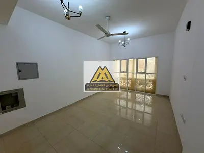 One-bedroom apartment with two bathrooms and a separate living room for annual rent – ​​Al Muwaihat 3, Ajman – Prime location