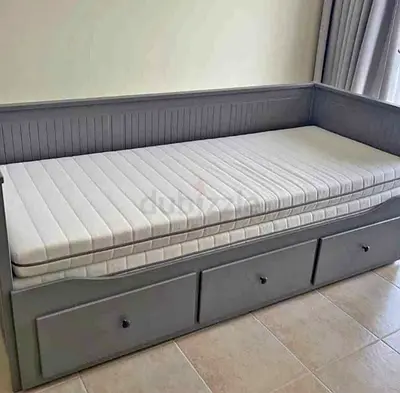 IKEA Hamnes Day bed with 3 storage drawers underneath and with 2 IKEA mattresses is available