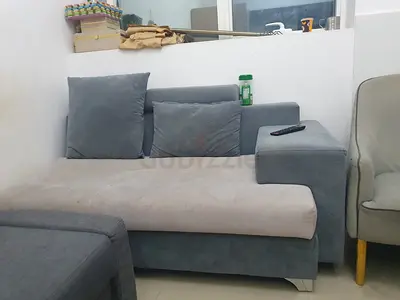 L-shaped grey fabric sectional sofa - good condition