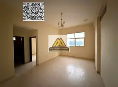 A spacious 2-bedroom apartment with a living room for annual rent in Al Jurf 1 – Ajman. It feature