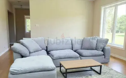 Marina home Luscious originaLight grey 4-seater L-shape sectional sofa with ottoman - good condition