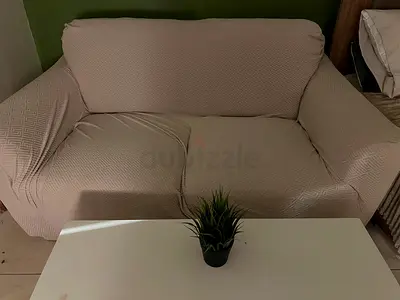 Beige 2-seater sofa in good condition