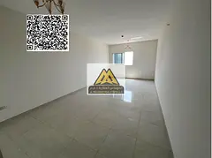 A 2-bedroom apartment for annual rent in a prime location near the Corniche. It features an open vie