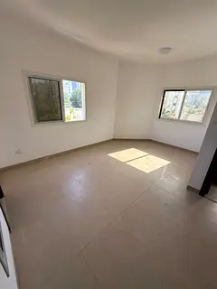 Brand new + elegant finishing + utilities included, 1BR + hall monthly rent in Al Rashidiya 3 Ajman,