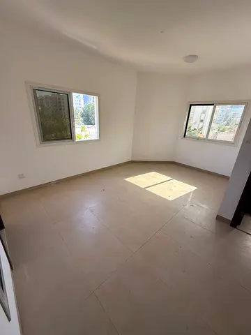 Brand new + elegant finishing + utilities included, 1BR + hall monthly rent in Al Rashidiya 3 Ajman, spacious layout, prime location. 🏡✨