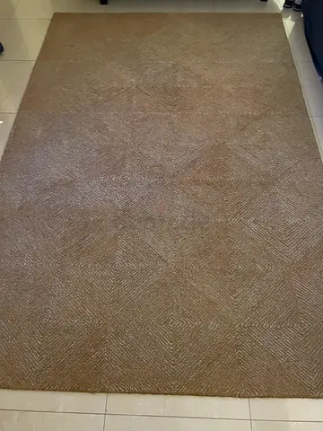 Burnt orange textured area rug - good condition, 2m x 3m.