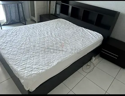Double bed with mattress frame and 2 side tables