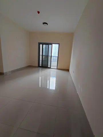A spacious two-bedroom apartment with a living room is available for annual rent in Al Majaz 3. The apartment enjoys a direct sea view in a lively and