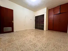 Furnished room with Balcony Available for rent in TCA on Hamdan Street Near Al Salama Hospital