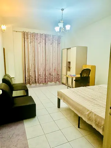 Fully Furnished Bedroom Available for Rent in Mankhool BurDubai Family building.