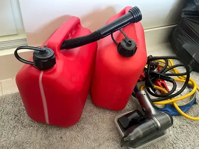 Set of 2 Red Plastic Fuel/Water Jerry Cans with Pour Spouts car vacuum and set of jump leads