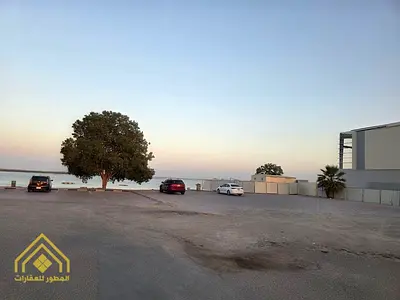 Residential land for sale, 6,400 sq ft, in Umm Al Quwain - Al Hamra, near the sea
