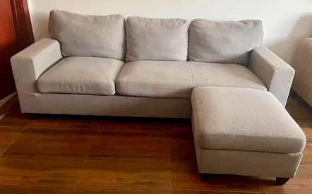Light grey 3-seater L-shape sofa with ottoman