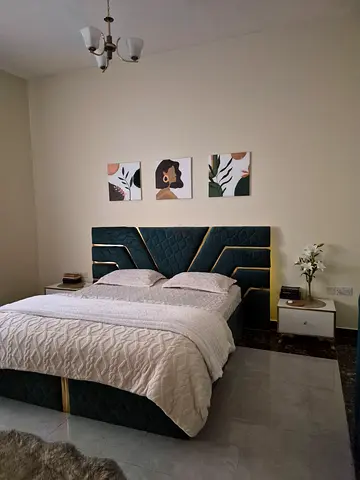 Queen bed with three side drawers (side tables not included)