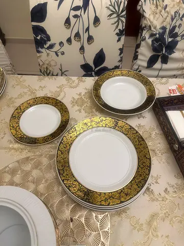 Set of Decorative Gold- trimmed 8 dinner, quarter and soup plates. Also tea set for 8. . Price 600