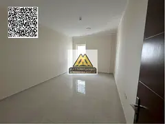 A distinctive apartment for rent in Al Jurf 2, Ajman, directly on Sheikh Ammar Street, with spacious