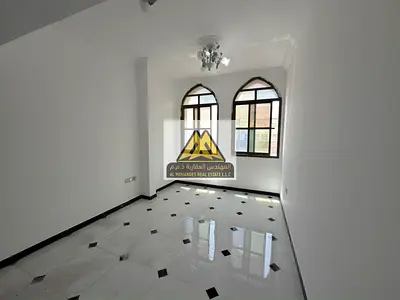 The apartment features a stylish layout with two bedrooms, a spacious living room, two bathrooms, and a balcony providing natural light and a pleasan